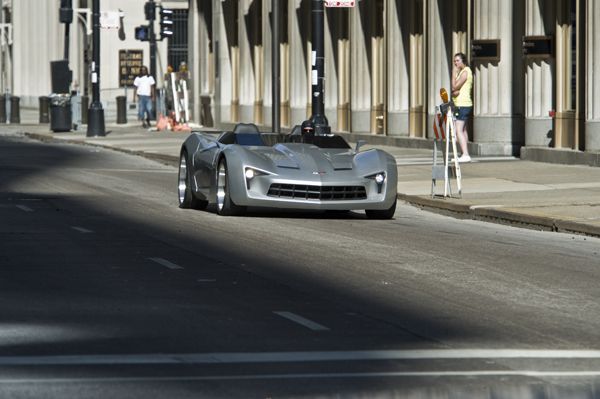  who transforms into a silver modified convertible Corvette Stingray